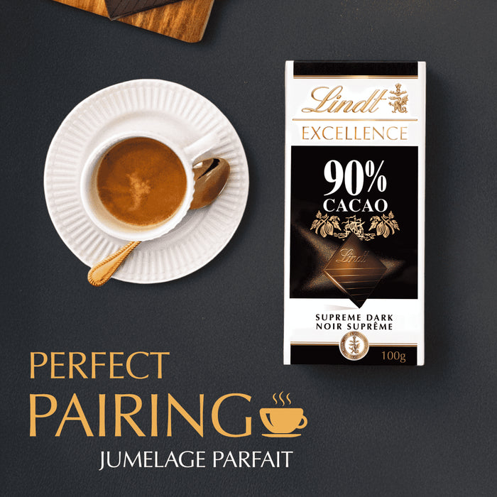 Lindt Excellence 90% Cacao chocolate bar with a cup of coffee on a dark background